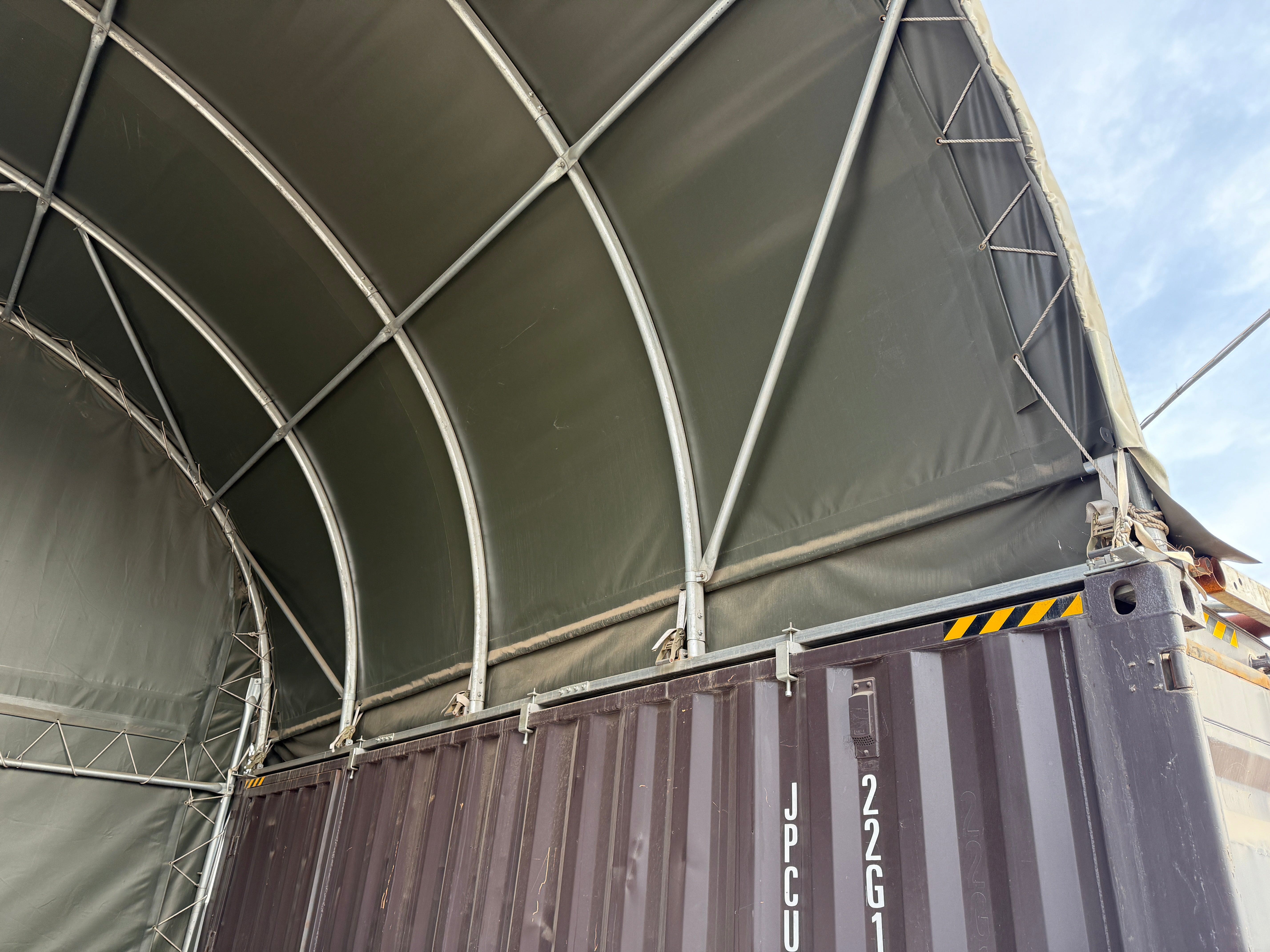 Sistemi i Kapjes për Tenda Kontejnerësh