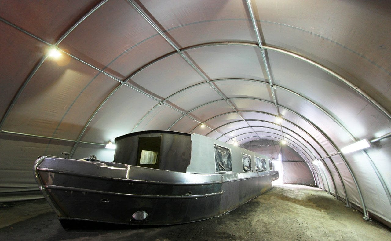 Boat inside storage tent